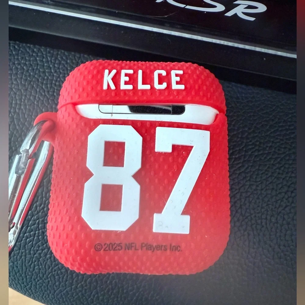 Used Apple AirPods, 2nd generation. NFL brand Kansas City Chiefs case.